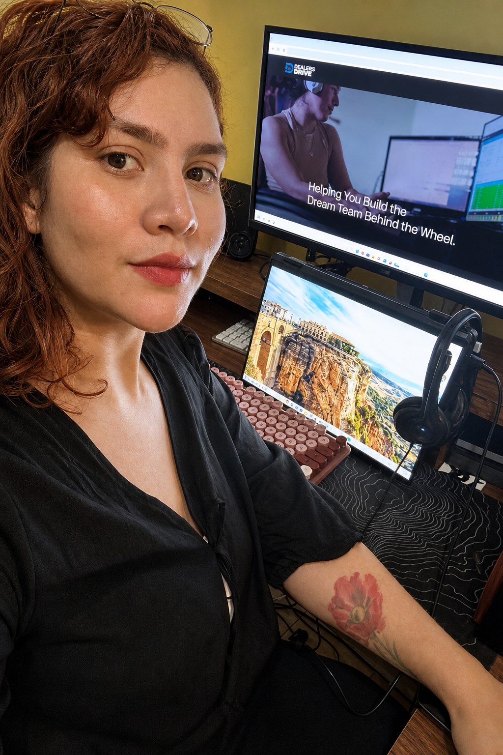 A Dealers in Drive teammate at a dual-monitor remote workstation